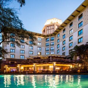 A premium hotel stay where you can enjoy fresh local coffee while looking at the Botanical gardens of Dar es Salaam