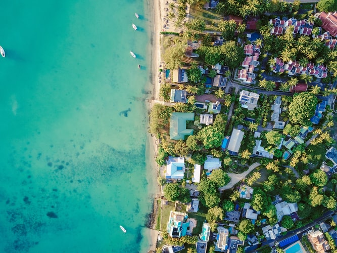 Snorkelling in the turquoise clear water and be served a mouth-watering barbecue lunch on you African Hideaways Vacation