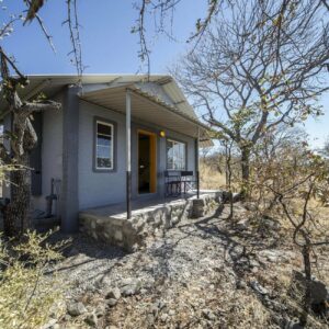 Enjoy breakfast amongst mopane trees before taking a drive towards Etosha National Park on your African safari getaway.