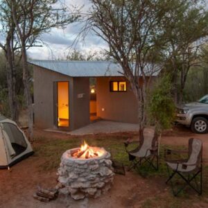 Spend the night in nature nestled in the trees of the Onguma Reserve