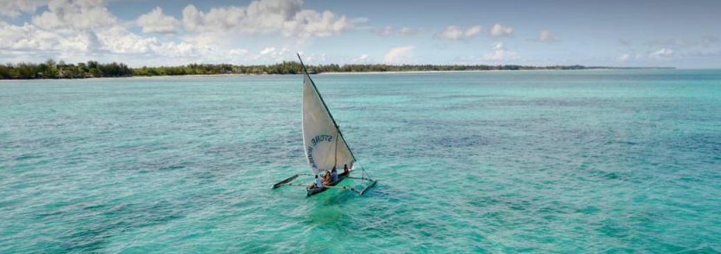 Get to ride in a traditional wooden boat called a dhow on your African Hideaways holiday