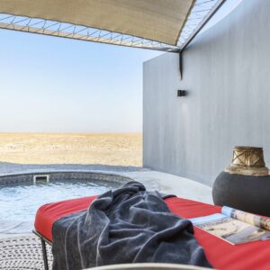 Visit the vast and spectacular Andoni Plains and artesian springs and spend the night under the stars at a 4-star lodge while on safari