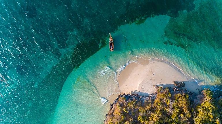 Dhow Boat sail sailing zanzibar tanzania island islet island tropical sun conservation amazing sun sea ocean fish barbeque lunch snorkeling